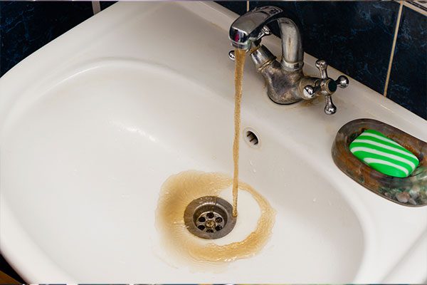 brown faucet water